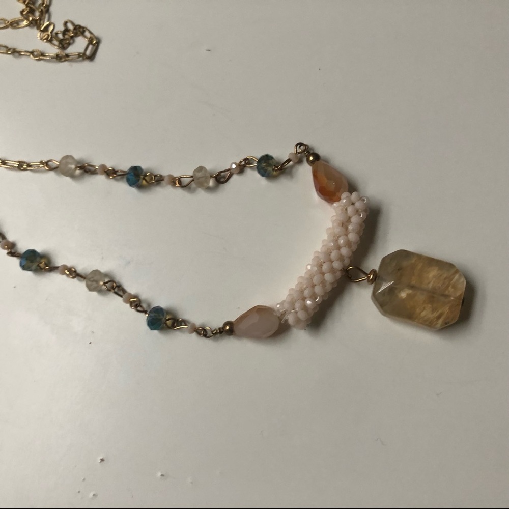 Long gold necklace